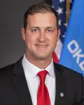 Portrait of Tom Woods